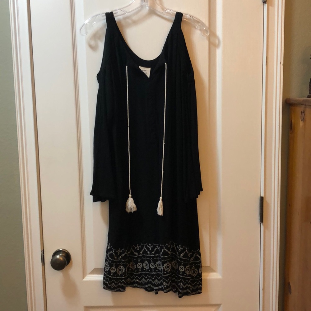 Black open shoulder dress.